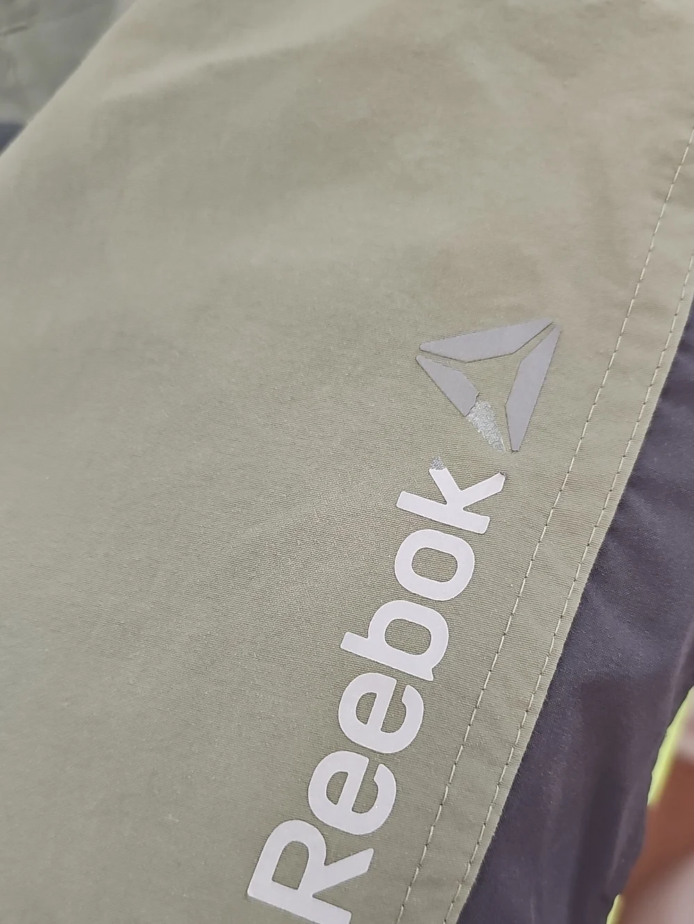 Reebok duel button